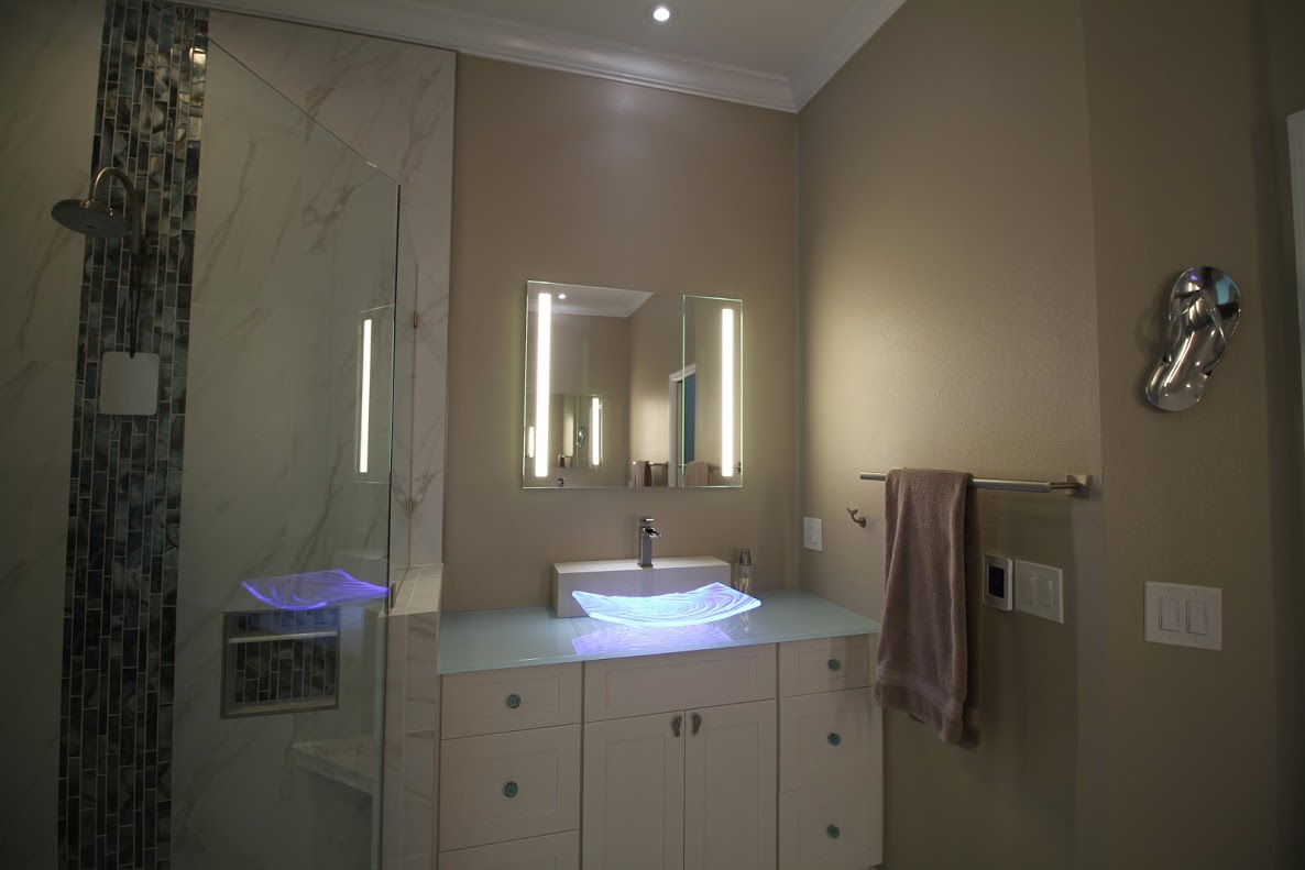 custom sink with light in bathroom