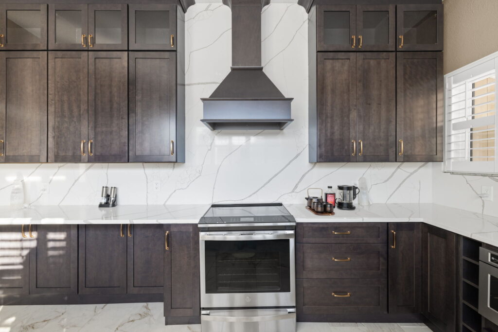 dark custom cabinets in white kitchen